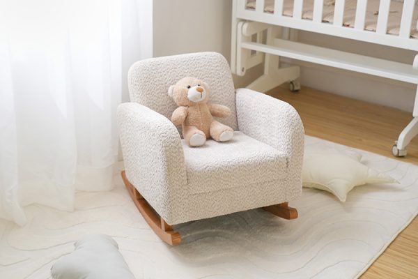 Kids Sofa Rocking Chair for Children's Room Cream Kids Sofa Rocking Chair with wooden rockers styled in a children's bedroom and nursery setting