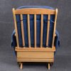 Wooden frame structure of nursery glider chair showing durable craftsmanship