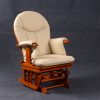 Cream High Back Glider Chair with Ottoman showing padded backrest and arm cushions