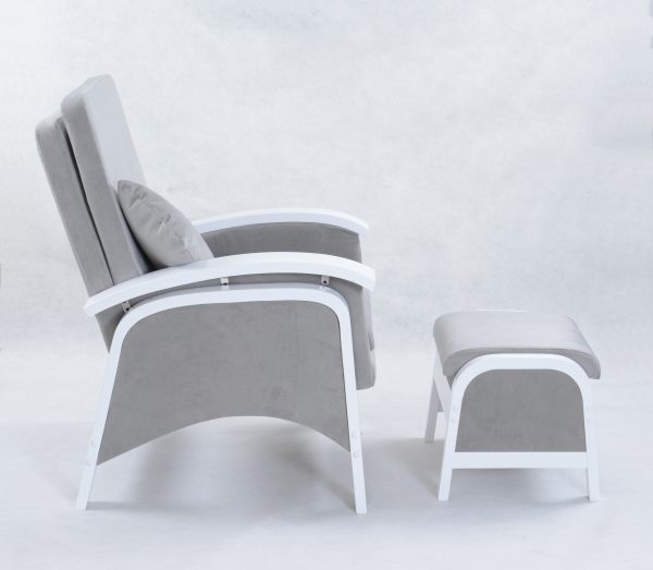 Side view of nursery glider chair with ottoman and curved armrests