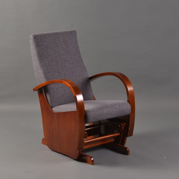Solid wood nursery glider chair with curved armrests angled view