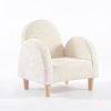 Upholstered Kids Chair with Wooden Legs Cream upholstered kids chair with rounded armrests and natural wooden legs
