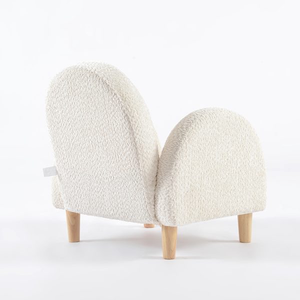 Upholstered Kids Armchair – Rear View Rear view of upholstered kids armchair with rounded back and cream textured fabric