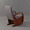 Rear angled view of solid wood nursery glider chair