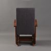 Back view of gray upholstered wooden nursery glider chair