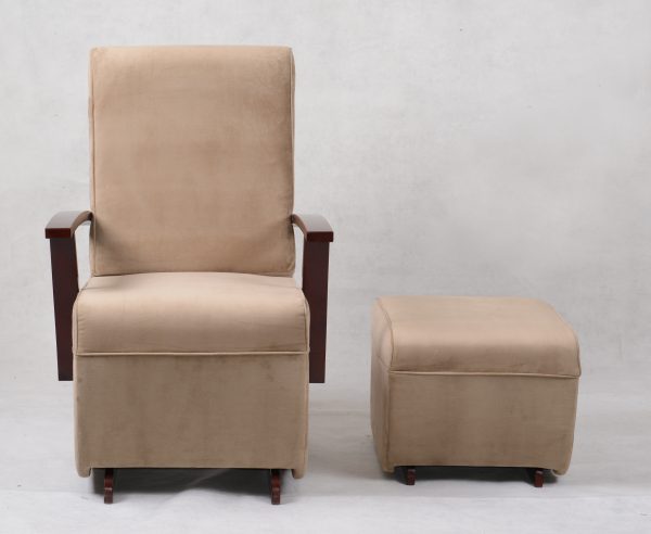 High back nursery glider chair with beige upholstery and matching ottoman
