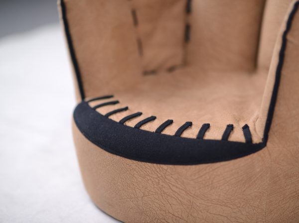 Baseball Glove Kids Chair Stitch Detail Close-up detail of black stitching on baseball glove kids chair