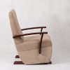 Side view of high back nursery glider chair with upholstered ottoman