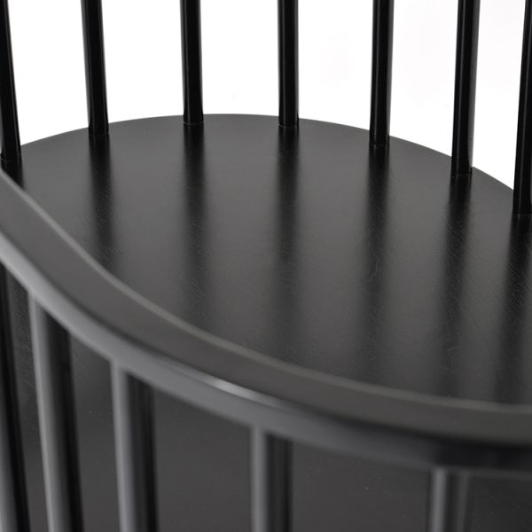 Wooden baby bassinet with oval sleeping area, vertical rails and black finish