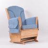 Modern nursery glider chair with wooden frame and soft blue upholstered cushions