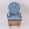 Nursery Glider Chair with Side Pockets Blue nursery glider chair with curved wooden arms and storage pockets