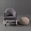 Upholstered Nursery Rocking Chair - Front View Gray upholstered nursery rocking chair with white wooden rocker base