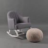 Modern Nursery Rocking Chair - Angled View Modern gray nursery rocking chair with curved wooden rocker base