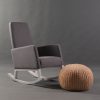 Upholstered Nursery Rocking Chair Upholstered nursery rocking chair with gray fabric and white wooden base