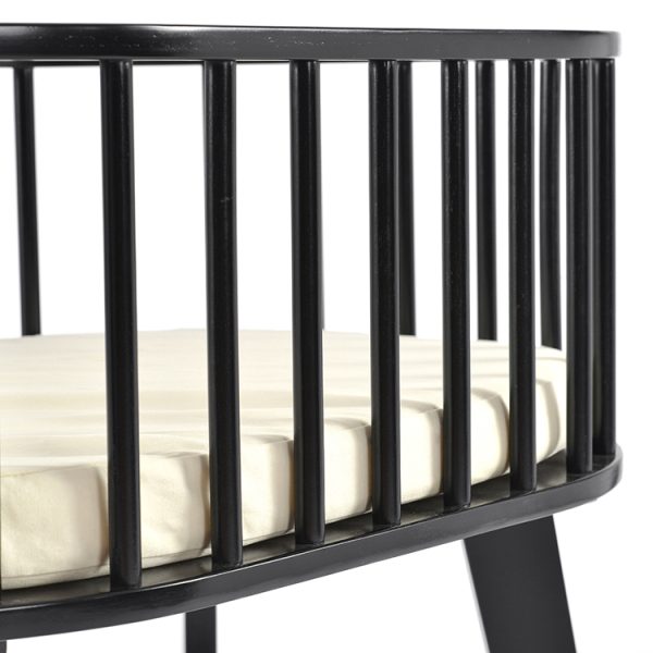 Newborn baby bassinet with cream mattress, oval wooden frame and black stand