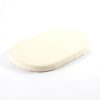 Cream baby bassinet mattress with rounded edges shown from an angled view