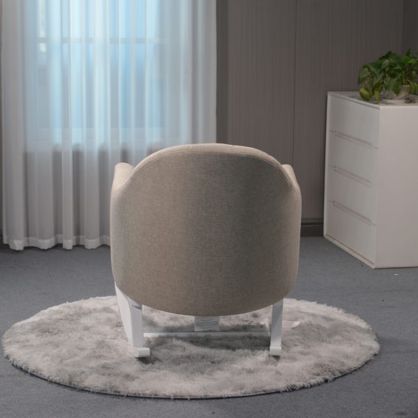 Upholstered Nursery Rocker - Back View Rear view of beige upholstered nursery rocking chair in modern room