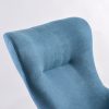 Close-up of blue wingback nursery rocking chair back upholstery