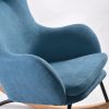 Close-up of blue wingback nursery rocking chair back upholstery
