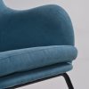 Close-up of blue wingback nursery rocking chair back upholstery