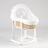 White wooden rocking bassinet stand with curved base