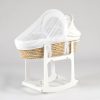 Wooden rocking baby bassinet with natural woven basket and white canopy