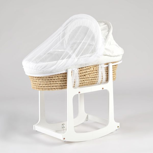 Wooden rocking baby bassinet with natural woven basket and white canopy