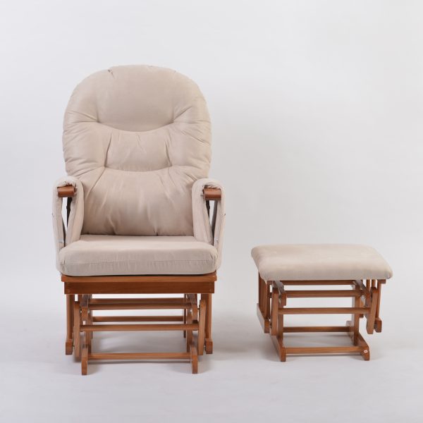 Tufted Padded Nursery Glider Chair Front View Front view of tufted padded nursery glider chair and matching ottoman