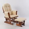 Cream Button Tufted Glider Chair with Ottoman showing curved wood arms