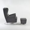 Side view of wingback nursery glider with ottoman and white rocker base
