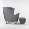 Back view of gray wingback nursery glider and matching ottoman