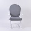 Front view of white wooden nursery rocking chair with gray cushions