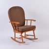 Brown wooden nursery rocking chair with upholstered seat and back cushions