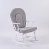 Scandinavian style wooden rocking chair with soft fabric cushion for home relaxation