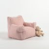 pink-kids-sofa-chair.jpg Pink upholstered kids sofa chair