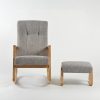 Gray Rattan Nursery Rocking Chair – Front View Front view of gray rattan nursery rocking chair with matching footstool