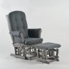 Gray Wooden Glider Chair with Ottoman – Angled View Angled view of gray wooden glider chair with dark padded upholstery and matching ottoman