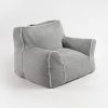 Grey Kids Bean Bag Chair – Angled View Angled view of soft grey kids bean bag chair with supportive backrest and wide cushioned seat