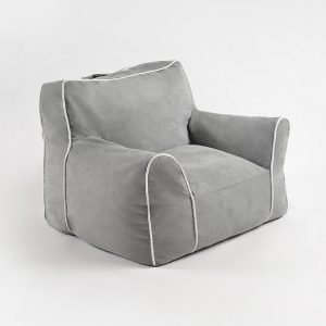 Grey Kids Bean Bag Chair – Angled View Angled view of soft grey kids bean bag chair with supportive backrest and wide cushioned seat