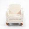 Boucle Kids Sofa Rocking Chair – Front View Front view of cream boucle Kids Sofa Rocking Chair with padded armrests and natural wooden rockers