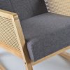 Dark Gray Rattan Rocking Chair – Front View Dark gray nursery rocking chair with rattan armrests and matching ottoman