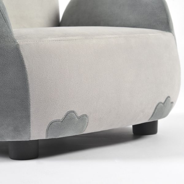 Close-up of upholstered kids sofa showing padded seat, decorative owl feet and low furniture legs