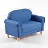 Two Seater Kids Sofa – Angled View Angled view of blue two seater Kids Sofa with padded seat and wooden legs