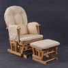 Nursery Glider Chair with Ottoman Padded nursery glider chair with wooden frame, side pockets and matching ottoman