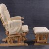 Wooden Nursery Glider Chair Side View Side view of padded wooden nursery glider chair with matching ottoman