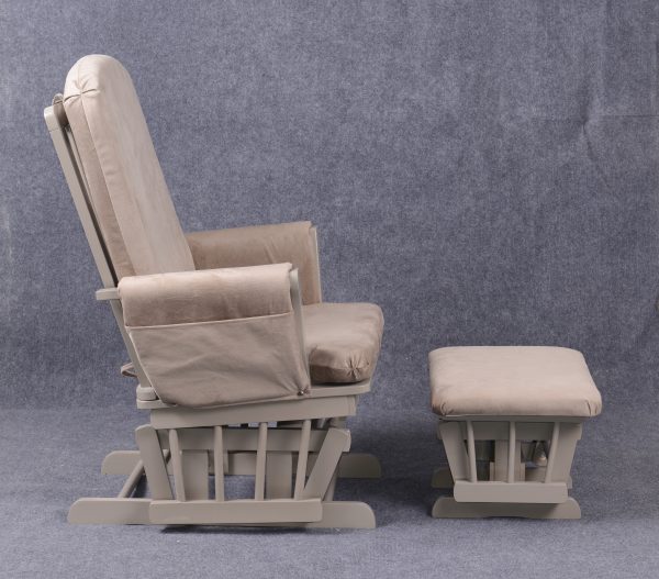 Side view of padded nursery glider with wooden frame and matching ottoman