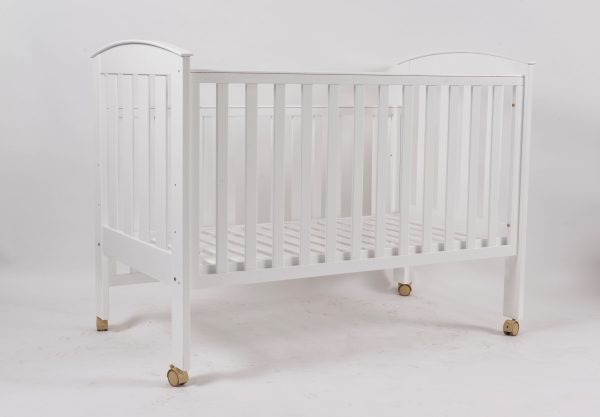 White mobile wooden baby crib with caster wheels