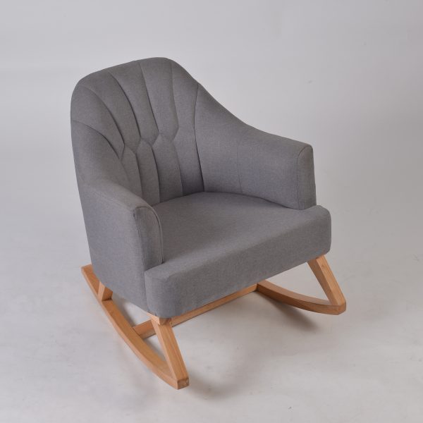 Upholstered nursery rocking chair with gray channel tufted back and wood base
