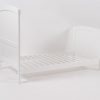 White Convertible Baby Crib to Toddler Bed White wooden convertible baby crib transformed into a toddler bed