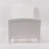 Convertible Crib Curved Footboard Curved footboard of white convertible baby crib and toddler bed